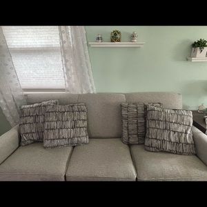 4 new, gray throw pillows